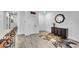 Bright foyer featuring elegant decor, a stylish console table, and hardwood flooring, creating a welcoming ambiance at 6318 Amber Sunrise St, North Las Vegas, NV 89031