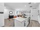 Modern kitchen seamlessly connected to the living and dining areas, perfect for entertaining and Gathering living at 6318 Amber Sunrise St, North Las Vegas, NV 89031