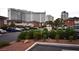 Exterior view of a multi-Gathering building with mature landscaping and ample parking at 634 Oakmont Ave # 1903, Las Vegas, NV 89109