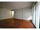 A living room featuring hardwood floors, neutral colored walls and natural light at 634 Oakmont Ave # 1903, Las Vegas, NV 89109
