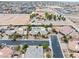 Picture of a gorgeous desert home with a backyard pool, tile roof, circular driveway, attached garage, and desert landscaping at 7504 Frittata Ave, Las Vegas, NV 89113