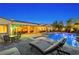 Resort-style backyard with covered patio, pool, hot tub, and plenty of seating at 7504 Frittata Ave, Las Vegas, NV 89113