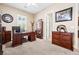 Bedroom offers ample space, complemented by neutral carpet and sophisticated dark wood furniture at 7504 Frittata Ave, Las Vegas, NV 89113