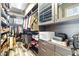 Spacious walk-in closet with custom shelving, drawers, and ample storage for clothes and accessories at 7504 Frittata Ave, Las Vegas, NV 89113