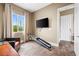 Bright exercise room with ample natural light and a view, perfect for a home gym setup at 7504 Frittata Ave, Las Vegas, NV 89113