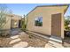 Exterior view of house showcasing desert xeriscaping at 7504 Frittata Ave, Las Vegas, NV 89113