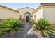 Home with desert landscaping and brick walkway at 7504 Frittata Ave, Las Vegas, NV 89113
