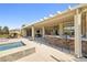 Enjoy outdoor living on this expansive covered patio, perfect for entertaining or enjoying a peaceful day at 7504 Frittata Ave, Las Vegas, NV 89113
