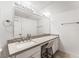 Bathroom featuring a granite countertop vanity, a large mirror, and ample lighting at 753 Oakmont Ave # 802, Las Vegas, NV 89109