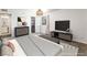 Inviting bedroom features soft, cozy carpet, stylish furniture, and access to a walk-in closet at 753 Oakmont Ave # 802, Las Vegas, NV 89109