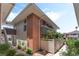 Low-rise apartment complex with brick facade, landscaped walkways, and private patios at 753 Oakmont Ave # 802, Las Vegas, NV 89109