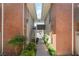Exterior view showcasing the brick facade and walkway leading to the building's entrance at 753 Oakmont Ave # 802, Las Vegas, NV 89109