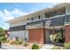 Low-rise apartment complex with stairs, a brick facade, and manicured landscaping at 753 Oakmont Ave # 802, Las Vegas, NV 89109