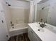 Updated bathroom with tub and vanity at 8017 Cherish Ave, Las Vegas, NV 89128