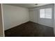 Clean and bright bedroom with carpet, window, and neutral colors at 8017 Cherish Ave, Las Vegas, NV 89128