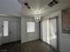 Bright dining space with updated flooring, natural light, and a modern ceiling fan at 8017 Cherish Ave, Las Vegas, NV 89128