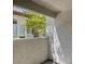 Patio with a textured wall and an opening to exterior trees at 8017 Cherish Ave, Las Vegas, NV 89128