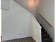 Carpeted stairs feature a white banister and wood handrail at 8017 Cherish Ave, Las Vegas, NV 89128
