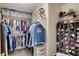 Well-organized walk-in closet with ample storage space including shelving and hanging rods to keep clothes neat at 831 E Galingale Ct, Henderson, NV 89015