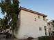 A two-story condo showcasing well-kept landscaping and a classic desert color palette at 855 N Stephanie St # 2311, Henderson, NV 89014