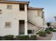 The building features a two-story exterior with well-maintained landscaping and walkways at 855 N Stephanie St # 2311, Henderson, NV 89014