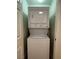 A stacked washer and dryer unit in a closet at 855 N Stephanie St # 2311, Henderson, NV 89014