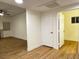 Living room showcasing wood floors, neutral walls, and modern lighting, offering a welcoming space at 855 N Stephanie St # 2311, Henderson, NV 89014