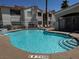 Community pool with ample shallow end and fencing at 855 N Stephanie St # 2311, Henderson, NV 89014