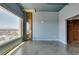 Bedroom featuring city views, large window, stone column and a closet at 900 Las Vegas Blvd # 1209, Las Vegas, NV 89101