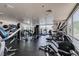 Bright gym with various exercise equipment and large windows overlooking the city at 900 Las Vegas Blvd # 1209, Las Vegas, NV 89101