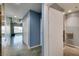 Hallway featuring modern design, leading to a bright space with floor-to-ceiling windows and scenic city view at 900 Las Vegas Blvd # 1209, Las Vegas, NV 89101