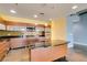 Kitchen with stainless steel appliances, dark countertops, and a kitchen island with cooktop at 900 Las Vegas Blvd # 1209, Las Vegas, NV 89101