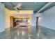 Open concept featuring concrete floors, blue and yellow walls, and stainless steel appliances at 900 Las Vegas Blvd # 1209, Las Vegas, NV 89101