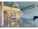 Open concept featuring concrete floors, blue and yellow walls, and modern appliances at 900 Las Vegas Blvd # 1209, Las Vegas, NV 89101