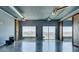 Bright, open living area boasting city views, concrete floors, and industrial-style ceiling at 900 Las Vegas Blvd # 1209, Las Vegas, NV 89101