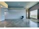 Open living space with concrete floors, city skyline view, and industrial modern accents at 900 Las Vegas Blvd # 1209, Las Vegas, NV 89101