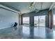 Spacious living room with concrete floors, city views, and industrial-style ceiling details at 900 Las Vegas Blvd # 1209, Las Vegas, NV 89101