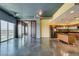 Spacious open floor plan with a partial kitchen view and expansive cityscape at 900 Las Vegas Blvd # 1209, Las Vegas, NV 89101