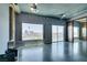 Spacious living room with exposed ductwork and large windows offering city views at 900 Las Vegas Blvd # 1209, Las Vegas, NV 89101