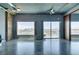 Open-concept living room with polished concrete floors, expansive windows, and a scenic city view at 900 Las Vegas Blvd # 1209, Las Vegas, NV 89101