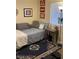Bedroom with a single bed and floral rug, offering a calm space at 903 Billings St, Henderson, NV 89002