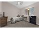 Comfortable bedroom with a neutral color scheme and a ceiling fan, providing a serene retreat at 903 Billings St, Henderson, NV 89002