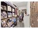 Organized walk-in closet featuring custom shelving and storage options for accessories and clothing at 903 Billings St, Henderson, NV 89002