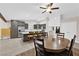 This expansive kitchen features stainless appliances, tile floors, and a large island with bar seating at 903 Billings St, Henderson, NV 89002