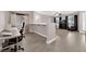 Open living area with tile floors, a built-in bar, and plenty of room to work and relax at 903 Billings St, Henderson, NV 89002