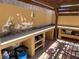 The outdoor kitchen offers an integrated countertop with bar seating and built-in storage at 903 Billings St, Henderson, NV 89002