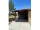 Relaxing covered patio with outdoor seating area, overlooking a well-maintained garden at 903 Billings St, Henderson, NV 89002