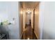 View of the home hallway with dark floors, neutral walls, and recessed lighting at 906 Sitting Bull Dr, Henderson, NV 89014