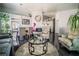 Bright open living area with fireplace, dining area, and comfortable seating at 906 Sitting Bull Dr, Henderson, NV 89014