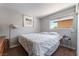 Bedroom features a minimalist decor, natural light, and a comfortable bed at 908 N 24Th St, Las Vegas, NV 89101